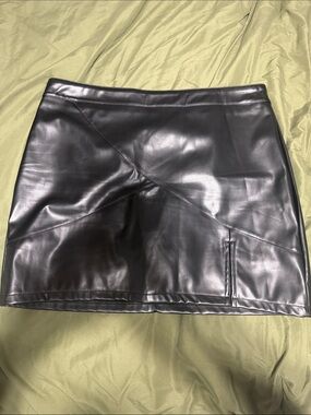 Sleek Black Faux Leather Mini Skirt with Diagonal Paneling